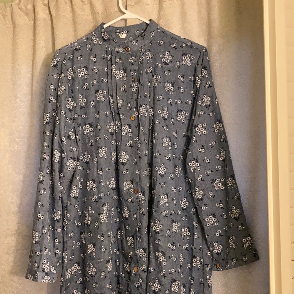 Blue flowered long sleeve shirt.